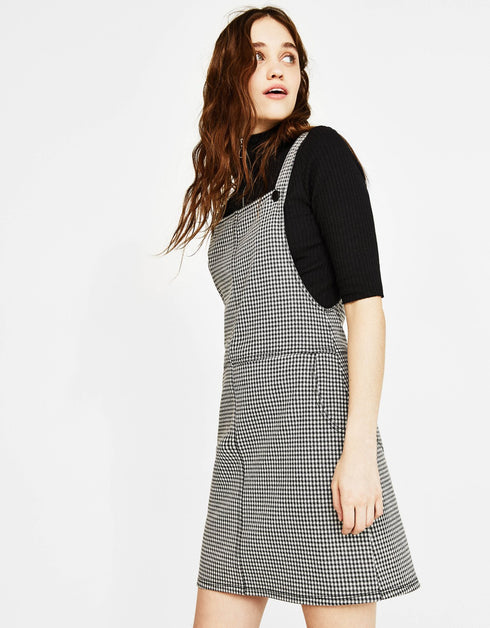 Short dungarees with pockets